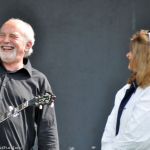 Greg Cahill stops for a chat with Cindy Baucom at Red, White & Bluegrass 2013 - photo by Bill Warren