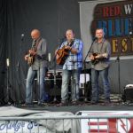Dustin Benson sitting in with Lonesome River Band at Red, White & Bluegrass 2013 - photo by Bill Warren