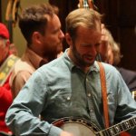 Members of Steep Canyon Rangers take part in the mega banjo jam at the dedication of the Earl Scruggs Center - photo by John Goad