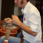 Chad Graves warming up before the Slidegras Extravaganza at World of Bluegrass 2012 - photo by David Morris