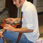 Chad Graves warming up before the Slidegras Extravaganza at World of Bluegrass 2012 - photo by David Morris