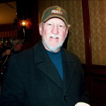 Doyle Lawson keeping warm at SPBGMA 2013 - photo by Valerie Gabehart