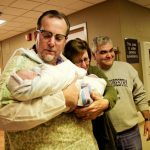 Adam Steffey with his twin sons, and happy grandparents Sue and Paul Trianosky