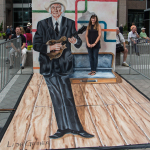 Artist Lisa Gaither with her art installation that lets folks take their photo with Bill Monroe at Wide Open Bluegrass 2016 - photo © Tara Linhardt
