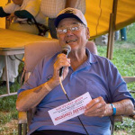 Carlos the Galax 2014 announcer from the back of the tent - photo by Tara Linhardt