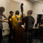WUNC was broadcasting live interviews and music from just down the street. Here are the Steel Wheels playing live on the air at World of Bluegrass 2015 - photo © Tara Linhardt