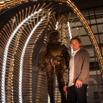 Bland Hoke with his Banjo Stand installation at Wide Open Bluegrass 2015 - photo by Tara Linhardt