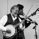 Joe Zauner and Wally Hughes with Valerie Smith & Liberty Pike showcasing in the Marriott Hotel at World of Bluegrass 2016 - photo © Tara Linhardt