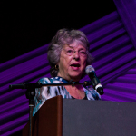 Darby Brandli presenting at the Special Awards at the 2016 Wold of Bluegrass - photo © Tara Linhardt