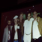 Photos displayed during the presentation of Jim Rooney's Distinguished Achievement Award at the 2016 Wold of Bluegrass - photo © Tara Linhardt