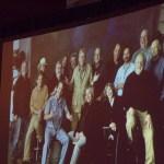 Photos displayed during the presentation of Jim Rooney's Distinguished Achievement Award at the 2016 Wold of Bluegrass - photo © Tara Linhardt