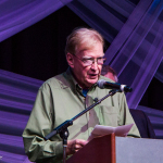 Jim Rooney accepts his Distinguished Achievement Award at the 2016 Wold of Bluegrass - photo © Tara Linhardt