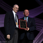 Tom Adams presenting Bill Emerson his Distinguished Achievement Award at the 2016 Wold of Bluegrass - photo © Tara Linhardt