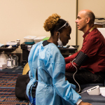 Free blood pressure checks at World of Bluegrass 2016 - photo by Tara Linhardt