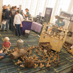Drove of wooden pigs at Wide Open Bluegrass 2015 - photo © Todd Powers