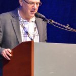 Jon Weisberger at the Keynote Address for World of Bluegrass 2014 (9/30/14) - photo by Bill Warren