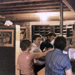 Gary Henderson looking through records at County Sales