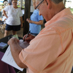 Allen Mills signs for fans at Wayside Bluegrass Festival (July 2012) - photo © Laura Tate Photography