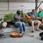 Street jam with saw at the 2016 Wide Open Bluegrass festival - photo by Frank Baker