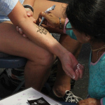 Temporary tattoo booth at the 2016 Wide Open Bluegrass festival - photo by Frank Baker