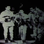 Photo of the young Ozaki Brothers projected on the big screen at World of Bluegrass 2013 - photo by Tar Linhardt