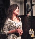 Carol Beaugard accepts the Brown Jug Award