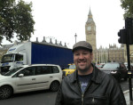 Stephen Mougin poses on the street, with Big Ben in the background