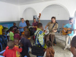 Henhouse Prowlers perform at an orphanage on the outskirts of Brazzaville