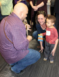 Frank Solivan jams at WAMU's open house for Martha Stracener Dantzic of Quicksilver Productions and her son, Sammy (2/1/14) - photo by David Morris