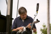 Béla Fleck picking a little banjo (uke) at Grey Fox 2015 - photo by Tara Linhardt