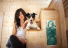 Lauren Stovall with Skippy in her tiny house