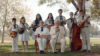 Danielle Wimberley (center) appears in the KFC mandolin orchestra
