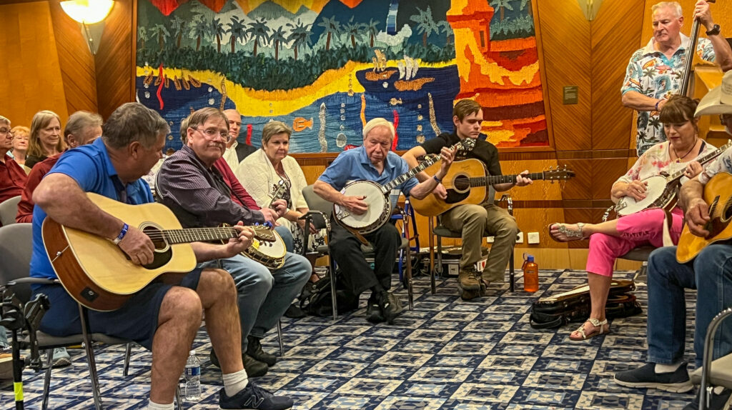 Little Roy Lewis jamming with all comers on Danny Stewart's Bluegrass Cruise 2026 - photo © Sandy Hatley